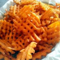 Basket of Waffle Fries · Waffle-shaped potatoes fries, crispy outside and tender inside.