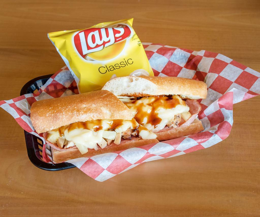Island Eruption Sandwich · Marinated chicken, canadian bacon, pineapple, swiss cheese, mayo and teriyaki sauce.