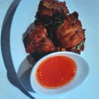 Golden Fritters (4 pieces) · Fried shrimp & chicken dumpling with sweet chillies sauce