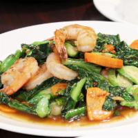 Pad Kana · Sauteed Chinese broccoli, carrot with chili and garlic.