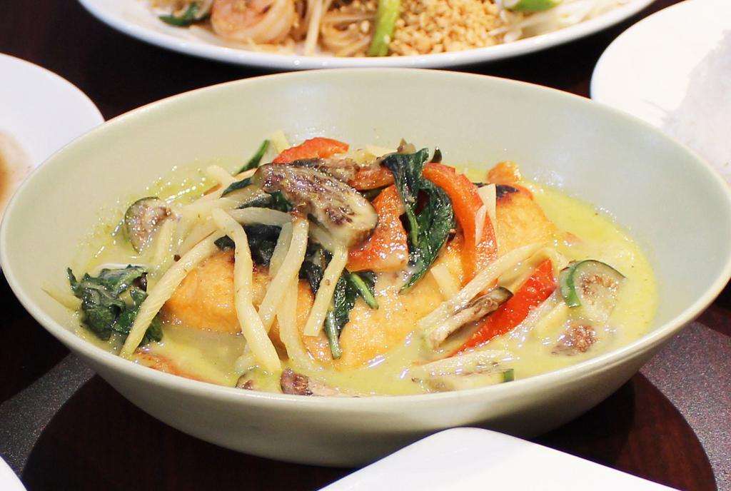 Green Curry · Bamboo shoot, bell pepper, basil leaves, Thai eggplant in coconut milk.
