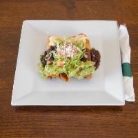 Flautas · 3 rolled crispy corn tortillas filled with chicken, served with chipotle aioli, guacamole, b...