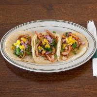 Al Pastor Taco · Pork, onions, cilantro and grilled pineapple. $4 each