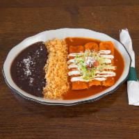 Enchiladas · 3 corn tortillas with choice of green or red sauce topped with pico de gallo, fresh cheese a...