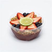 Lime-Tastic Bowl · Organic acai, peach juice, pineapples, peaches, strawberries and fresh lime. Topped with gra...