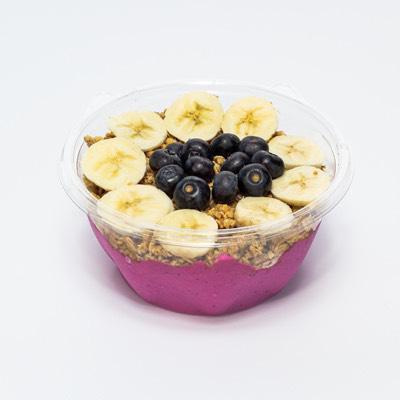 PB Power Bowl · Organic pitaya, almond milk, peanut butter and bananas. Topped with granola, honey, bananas and blueberries.