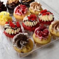 Assorted Dozen Mini Cupcakes · Miniature versions of our best cupcakes. Pre-assorted. (No fillings.)