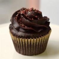 Chocolate Supreme Cupcake · Dark chocolate cake filled with chocolate fudge and iced with bittersweet chocolate frosting...