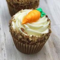 Carrot Cupcake · Carrot cake with a traditional cream cheese frosting rolled in oat streusel.