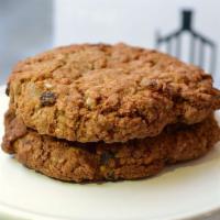 Big Oatmeal Energizer Cookie · Big and thick oatmeal cookie with coconut, sunflower seeds, candied ginger, and rum-soaked r...