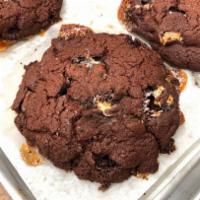 Gooey Marshmallow Chocolate Cookie (G.F.) · Generous, decadent flour-less, bittersweet chocolate cookie with marshmallows baked in and s...