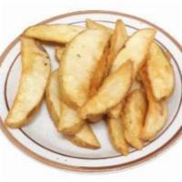 Potato Wedges · All natural, skin-on potato wedges.