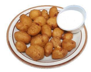 Crispy Cheese Curds · Real Wisconsin white cheddar cheese curds.