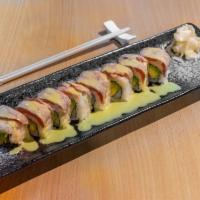 Maguro Tataki Maki Special Roll · Seared tuna avocado roll topped with maguro tataki and wasabi sauce.