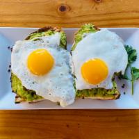 Avocado Toast · Sliced Avocado, red chili flakes, cilantro & lime on toasted country bread.