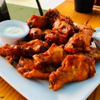 Wings · 6 or 12pc wings, with choice of spicy BBQ, buffalo or teriyaki sauce. Served with carrots, c...