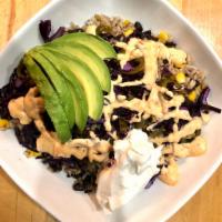 Baja Bowl · Brown rice, black beans, corn, purple cabbage, avocado, pickled jalapeños, sour cream & chip...