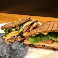 Mexican Twist Panini · Spicy grilled chicken, brown rice & beans, avocado, pepper jack cheese, romaine lettuce, tom...