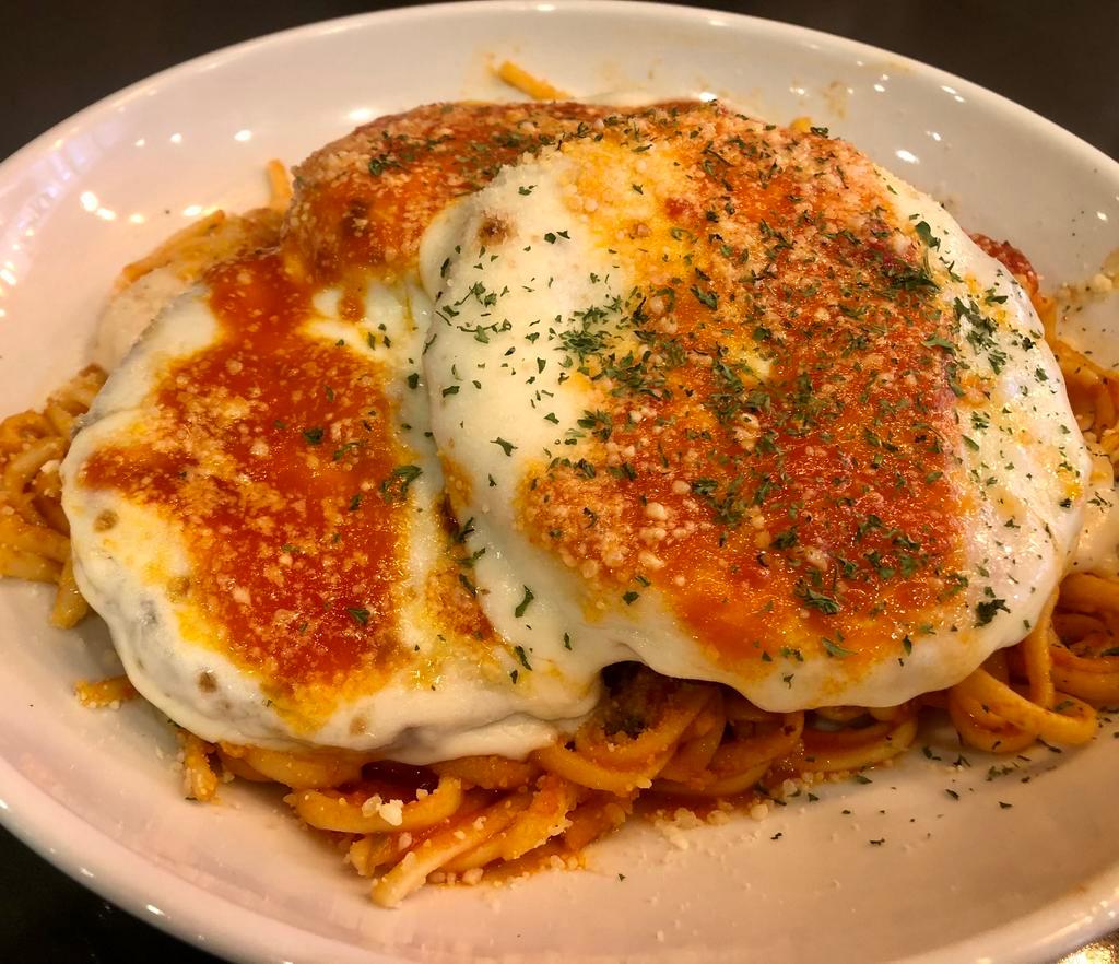 Eggplant Parmigiana · Made or covered with Parmesan cheese.