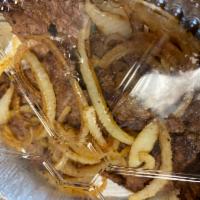 Onion Steak · Bistec encebollado. Served with rice, black or pinto beans or fried sweet or green plantains.