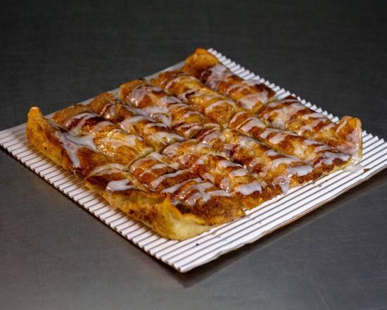 12 Pieces Cinnamon Stix · Freshly baked bread topped with cinnamon and vanilla icing.