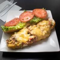 Philly Cheese Steak Sandwich · Made with green peppers,onions & your choice of Melted Cheese