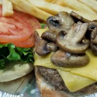 4. Mushroom Cheeseburger · Served with lettuce, tomato and french fries.