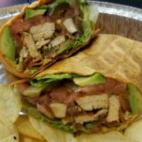 12. Hell's Kitchen Wrap · Grilled chicken, sauteed onion, avocado, jalapeno, lettuce, tomato and Buffalo sauce.