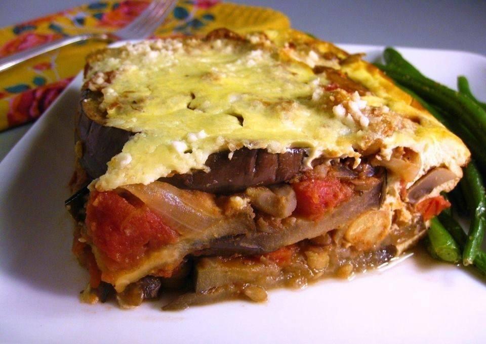 Mousaka Plate · Layered eggplant, zucchini, and potato with seasoned meat filling topped with a creamy bechamel sauce.