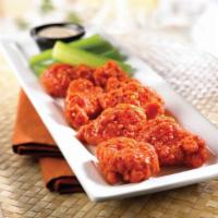 Boneless Wings · Breaded and fried boneless wings. Served with celery and choice of blue cheese or ranch.