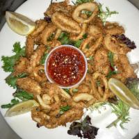 Fried Calamari · Tender squid lightly dusted in seasoned flour and fried. Served with marinara sauce.