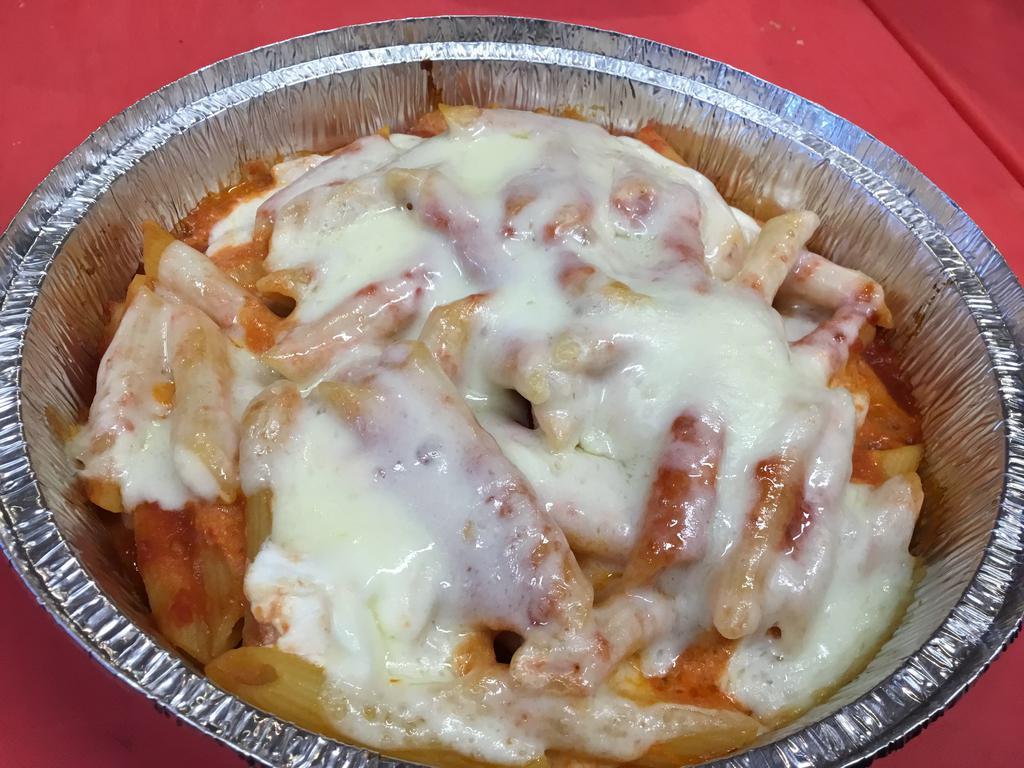 Baked Ziti · Ziti tossed with ricotta and tomato sauce. Topped with mozzarella, then baked.