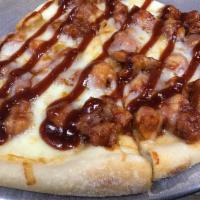 BBQ Chicken Pizza · Tangy BBQ sauce, breaded and fried chicken and mozzarella.