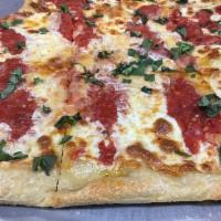 Grandma's Pizza · Thin Sicilian pizza with extra virgin olive oil, crushed tomatoes, basil, garlic, oregano an...