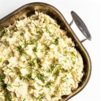 Mashed Potatoes  · Our family recipe, mashed yukon potatoes blended with fresh cream, butter, garlic and chives...