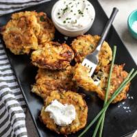 Potato Latke · With egg, chives and onions.