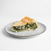 Spanakopita · A Greek classic with a twist. Thin leaves of Moroccan brik dough with spinach and feta chees...
