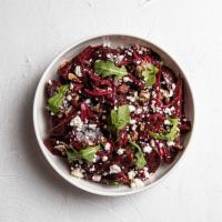Roasted Beets, Goat Cheese, and Toffee Pecans · Roasted beets and shallots tossed in a balsamic vinaigrette and topped with arugula, crumble...