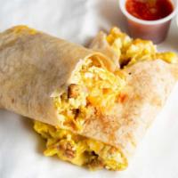 Sausage-Egg & Cheese Taco · Folded tortilla with a variety of fillings such as meat or beans. 
