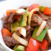 83. Pepper Steak with Onions  · Served with white or brown rice. 