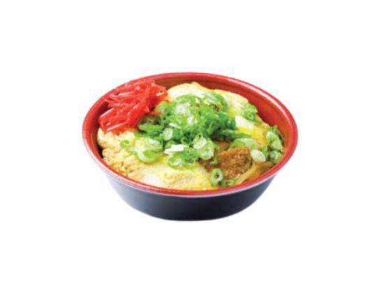 Pork Katsu Don · Pork katsu and simmered egg over white or brown rice. Topped with scallions and pickled red ginger.