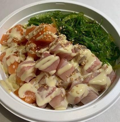 Seafood Fun Poke · Salmon, Yellowtail, Seaweed Salad, 
Wasabi Mayonnaise Sauce and White Sesame Seeds