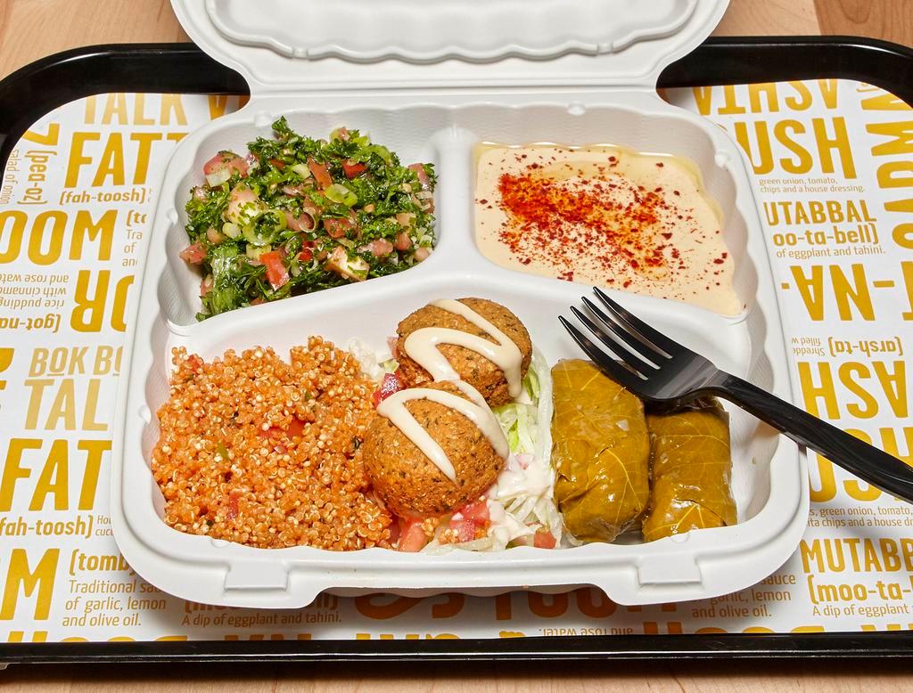 Veggie Plate · Made to order falafel, stuffed grape leaves, quinoa salad served with tabouleh or garden salad.
