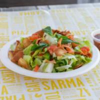 Spring Salad (Fattoush) · Chopped salad with Romaine lettuce, green onion, tomato, cucumber, bell pepper, pita chips, ...