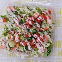 Tahini Salad · Shredded lettuce with chopped tomato, drizzled with tahini sauce. Vegan, Gluten Free. 
