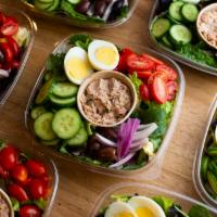 Tuna Salad Platter · Market green salad topped with tuna salad, tomatoes, cucumbers, red onions, hard-boiled egg,...