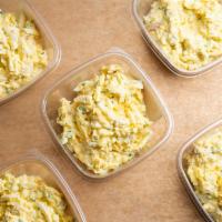 Egg Salad · Egg salad, caramelized onions, and chives.