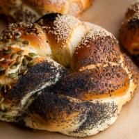 Festive Challah · Round, braided challah with a seed selection - sesame seed, nigella seeds, sunflower seeds, ...