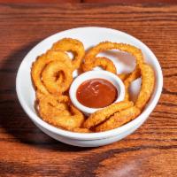 Onion Rings · Beer battered onion rings and BBQ sauce.