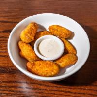 Jalapeno Poppers · Stuffed with cheese and fried. Served with ranch dip.